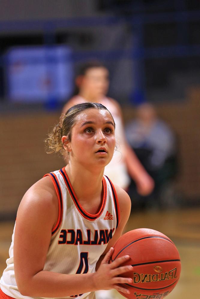 Kallie Tinker (0) lines up a free throw shot. 